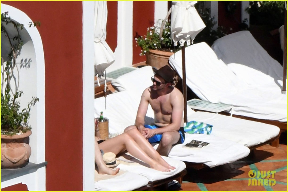 Nicholas Hoult Shirtless: Relaxing Poolside in Positano